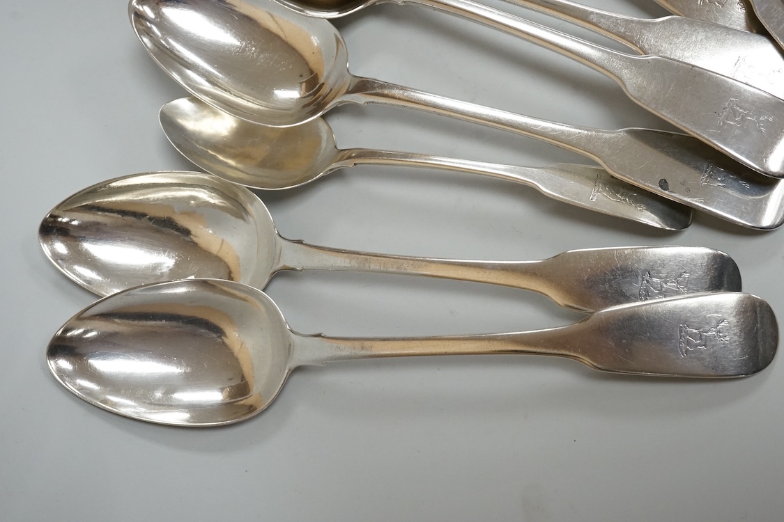 A set of six late George III Irish silver fiddle pattern table spoons and six matching dessert spoons, Philip Weekes, Dublin, 1818, 20.6oz.